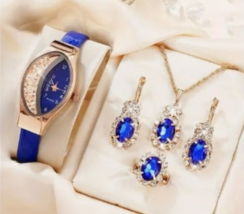 Divashine Jewelry Gift Set featuring a blue watch, necklace, earrings, and ring with sparkling accents
