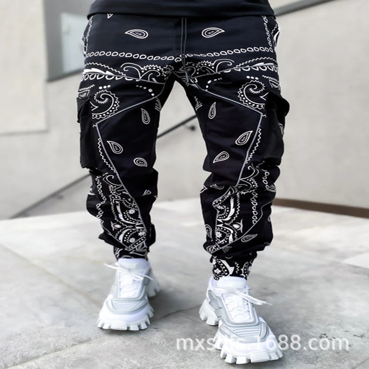 Stylish 3Sixty5 alpha drift wide-leg pants in black with a bold bandana print for a trendy look
