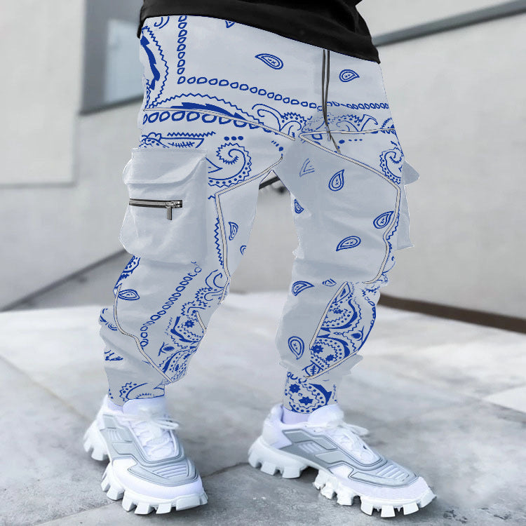 Stylish 3Sixty5 alpha drift wide-leg pants featuring a unique blue paisley pattern and cargo pockets