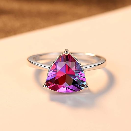 Colorful Gemstone Fashion Ring with a triangular purple and pink gemstone on a silver band