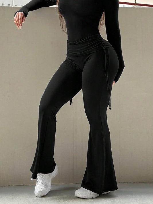 Black flared leggings by Stylish 3Sixty5, offering a sleek look and featuring comfortable stylish trousers