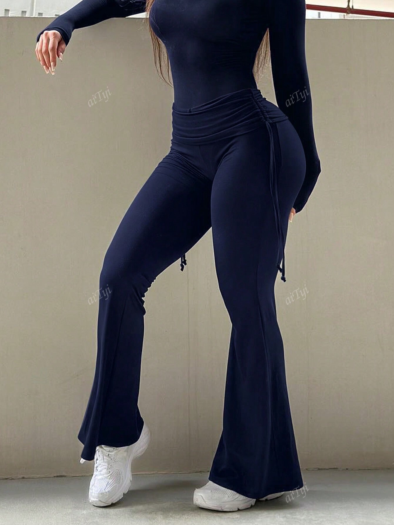 Stylish 3Sixty5 comfortable stylish trousers in navy blue with flared legs and adjustable ties