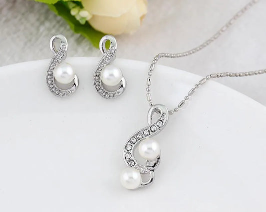 Danbi Pearl Jewelry Set featuring elegant silver necklace and matching earrings with pearls