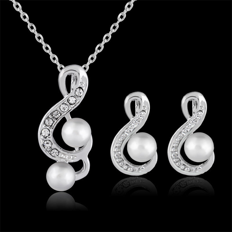 Danbi Pearl Jewelry Set featuring elegant necklace and matching earrings with pearls and sparkling accents