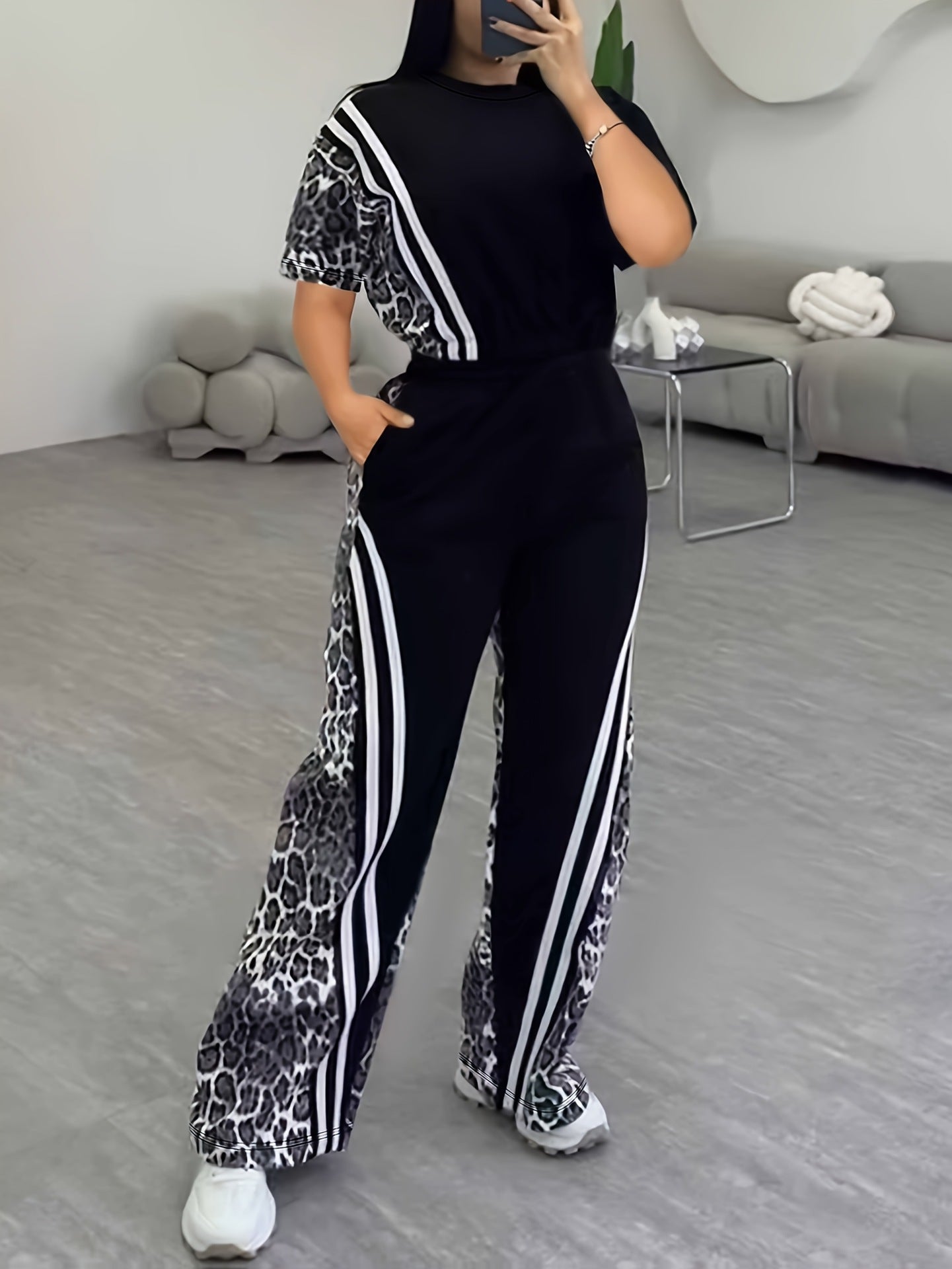 Stylish 3Sixty5 modern matching set for women in black with leopard print accents