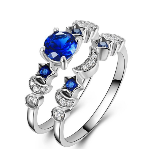 Stylish 3Sixty5 moon and star ring design with blue gemstones and shimmering accents