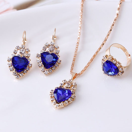 Elegant Stylish 3Sixty5 rhinestone jewelry set with heart-shaped blue gems and gold accents
