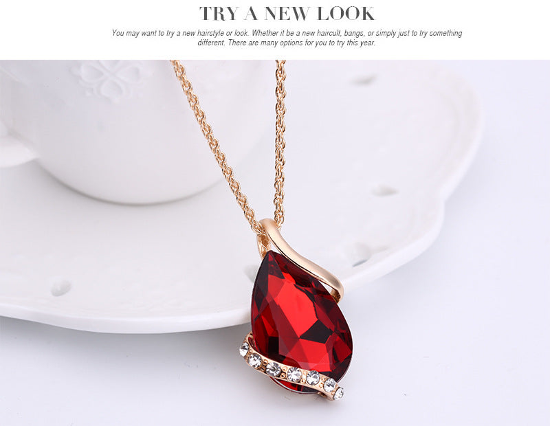 Stylish 3Sixty5 royal dewdrop jewelry set featuring a vibrant red pendant necklace with sparkling accents