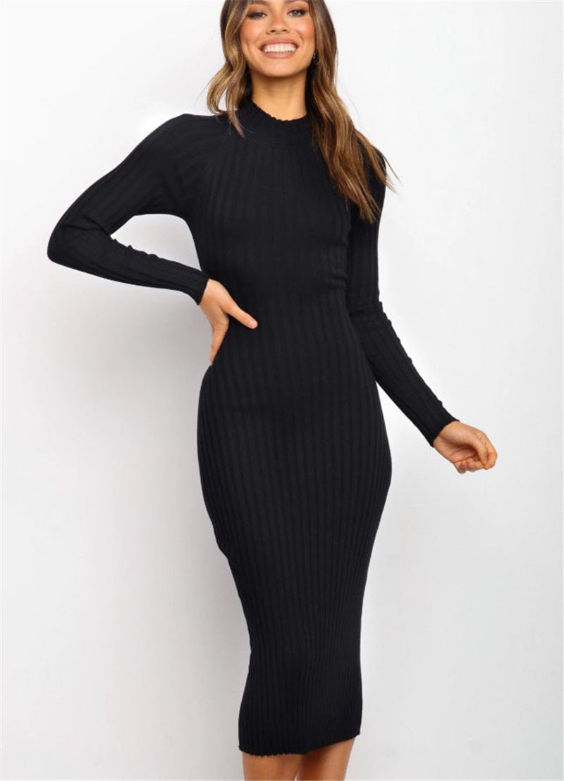 Stylish 3Sixty5 sculpted fit back bow dress in black with ribbed texture and long sleeves
