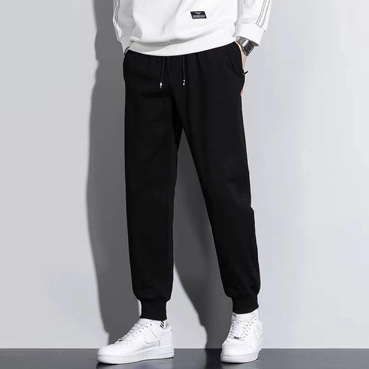 Stylish 3Sixty5 ShadowStride athletic pants in black with adjustable drawstring and tapered fit