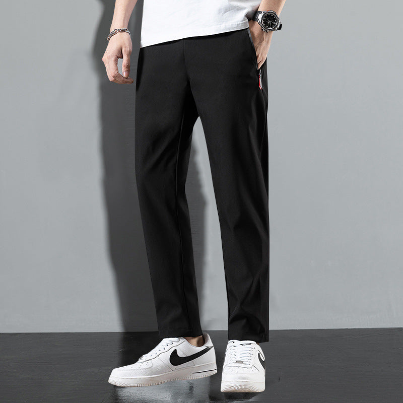 Stylish lightweight trousers in black, perfect for casual and active wear with a sleek design