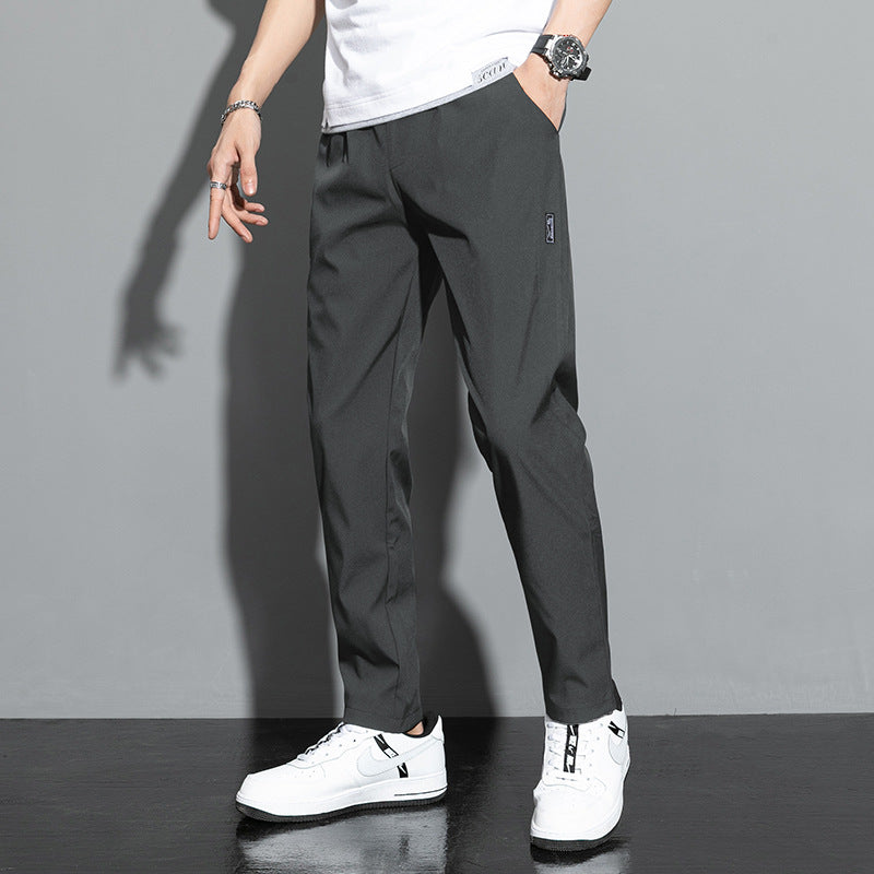 Stylish lightweight trousers in dark gray, perfect for casual wear and everyday comfort