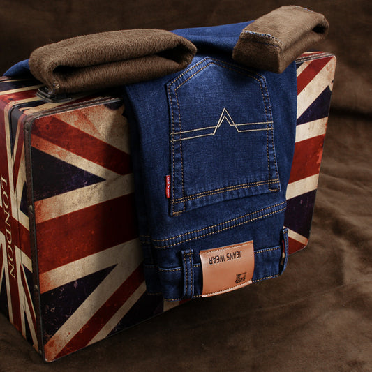 Stylish 3Sixty5 Veluxe warm formal trousers displayed on a vintage suitcase