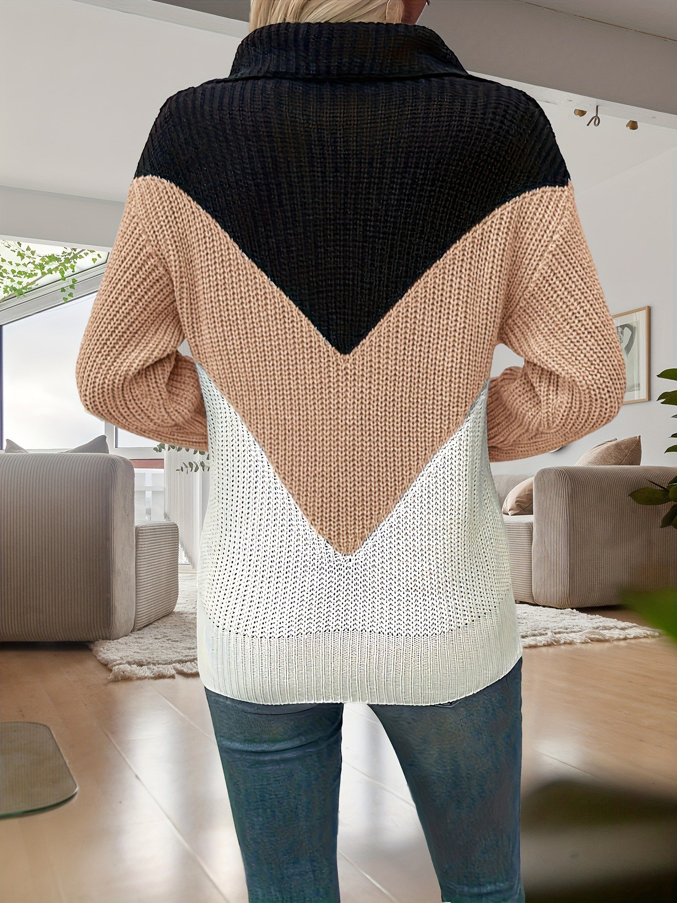 Back view of Stylish 3Sixty5 zip contrast lapel sweater with a color-block design in black, beige, and white